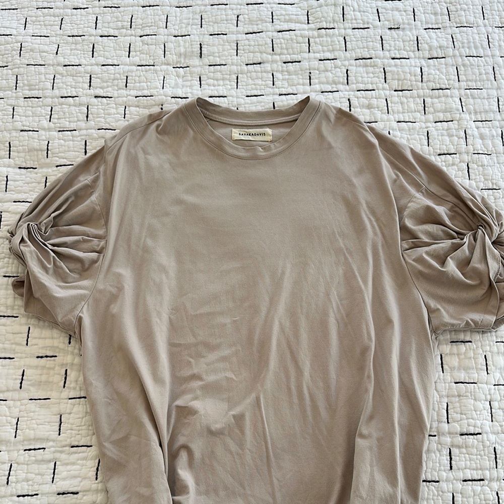 Sayaka Davis Beige T-Shirt Dress with twisted sleeves and pockets